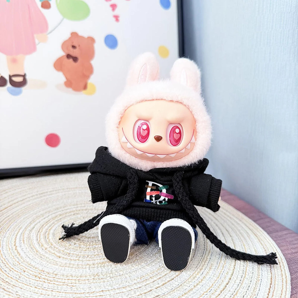Black Hoodie + Dark Jeans + Black Canvas Shoes