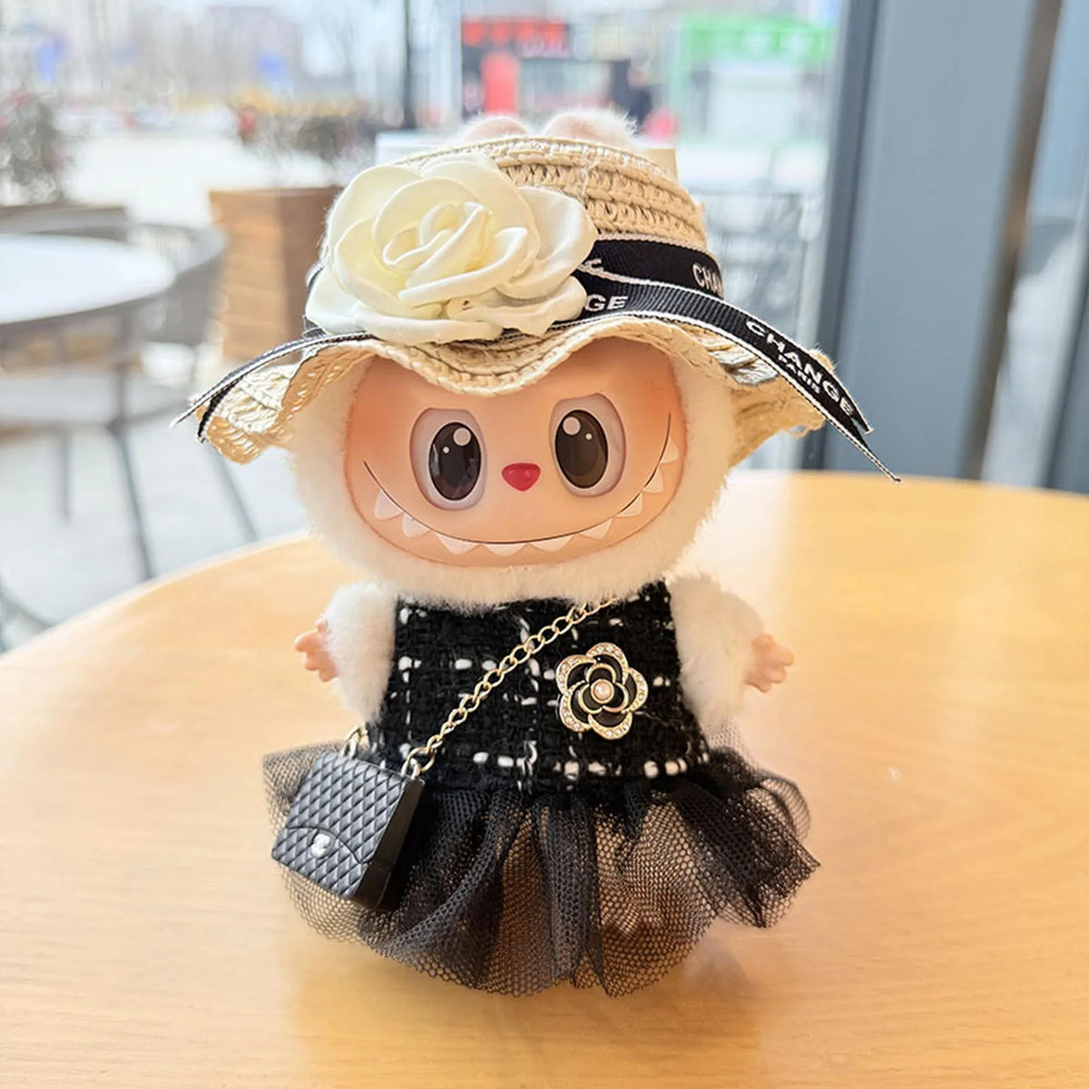 Black-Trimmed White Straw Hat + Black Lace Skirt With Elegant Flair