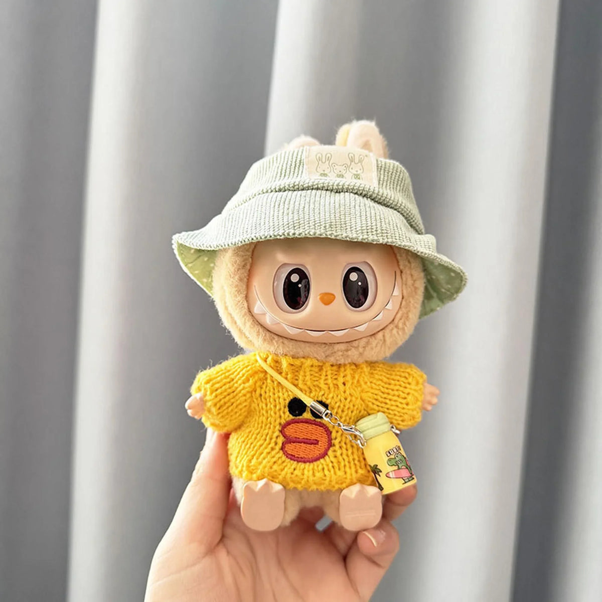 Green Bunny Hat + Yellow Duck Sweater + Yellow Water Bottle