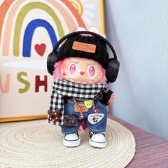 Joyful Pizza In Black Outfit With Black Cap, Black Canvas Shoes, And Black Headphones
