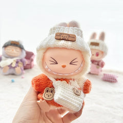 Orange Striped Button Sweater + White Flipped-Brim Hat + White B Bag