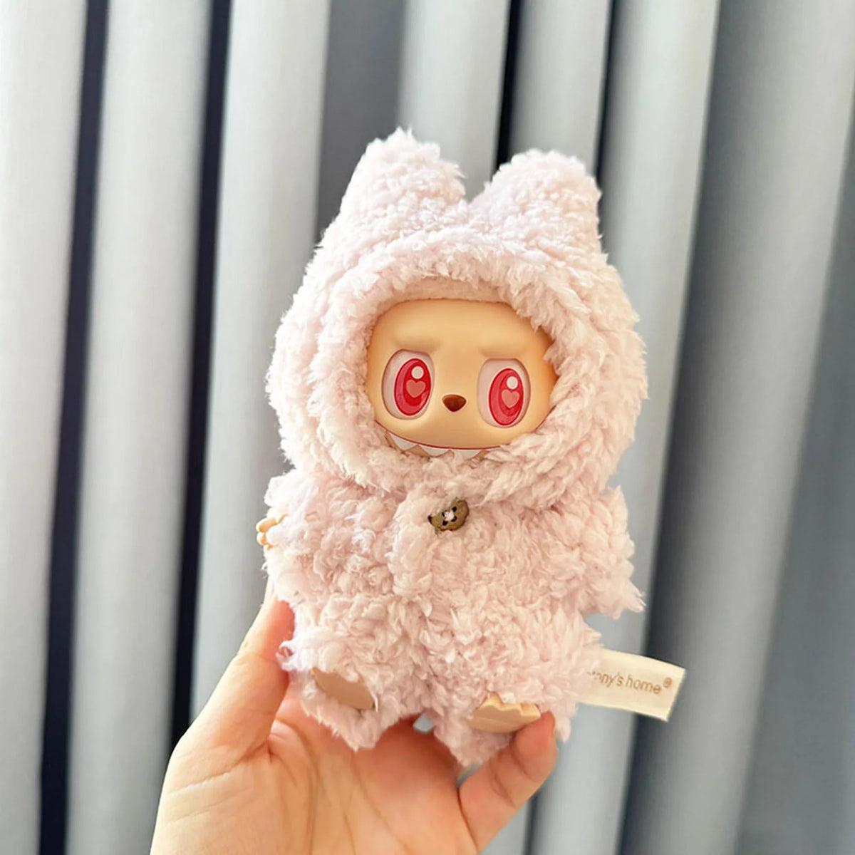 Pink Plush Jumpsuit With Dangly Accessories