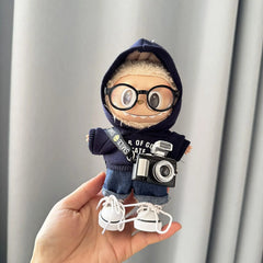 Small Black Sunglasses + Black Camera + Small White Canvas Shoes + Dark Blue Hooded Two-Piece Sweatshirt