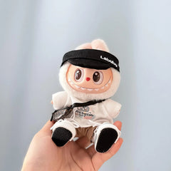 White Finny Tee + Khaki Pants + Brown V Bag + White Canvas Shoes + Black Bubu Cap