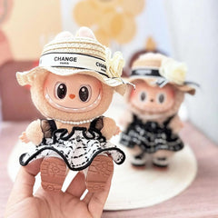 White-Trimmed Straw Hat + Pearl Necklace + White Checkered Chanel-Style Pinafore Dress
