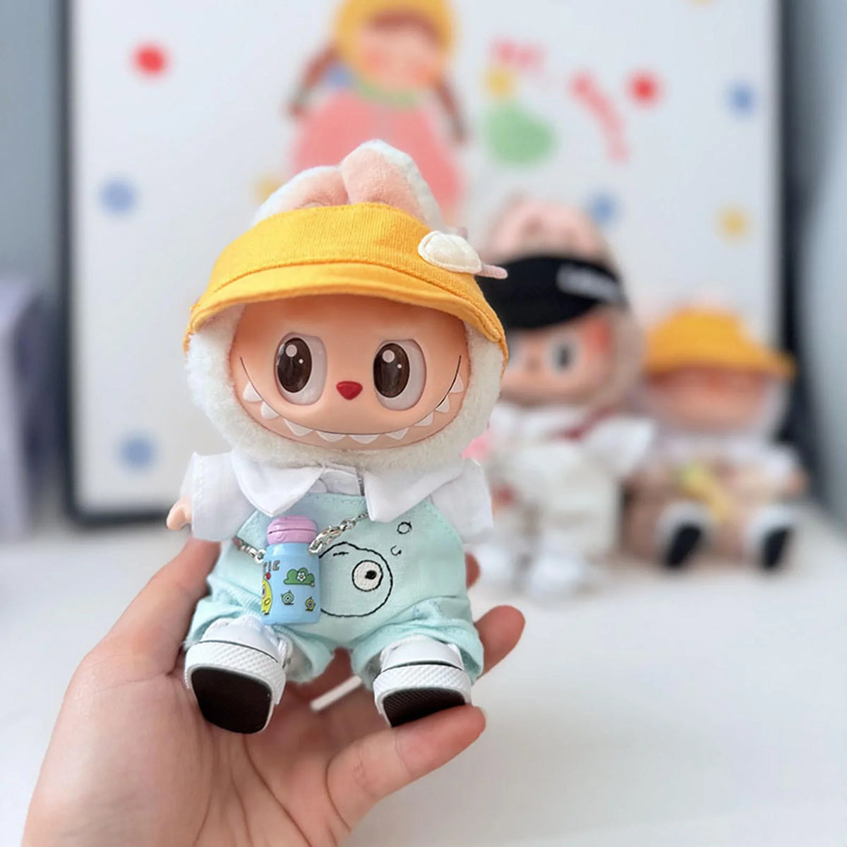 Yellow Radish Duckbill Hat + Bubble Fish Overalls + White Canvas Shoes + Blue Water Bottle