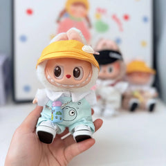 Yellow Radish Duckbill Hat + Bubble Fish Overalls + White Canvas Shoes + Blue Water Bottle
